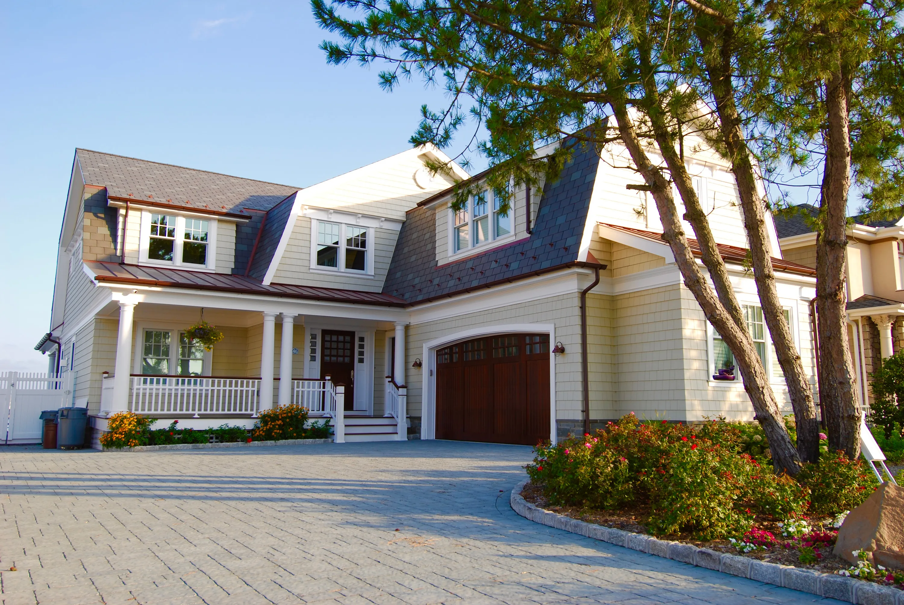 Completed coastal residence viewed from a landscaped drive in New Jersey.