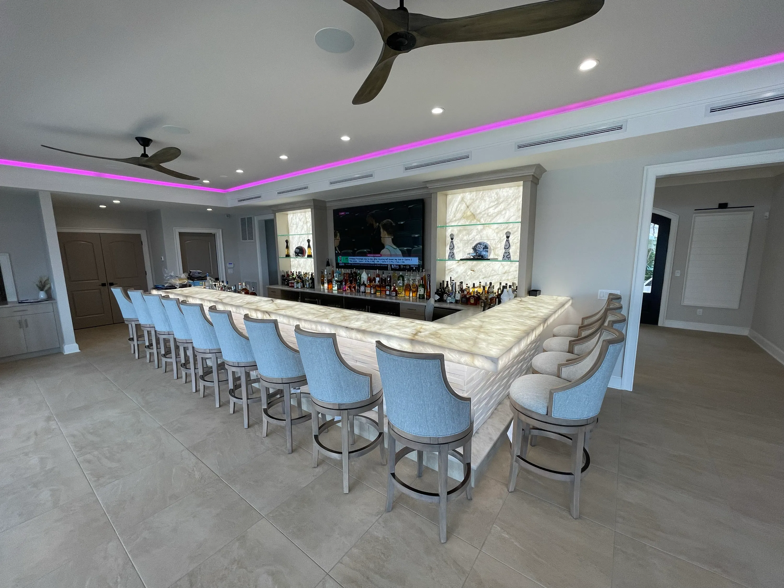 Bar and lounge area arranged for waterfront entertaining.