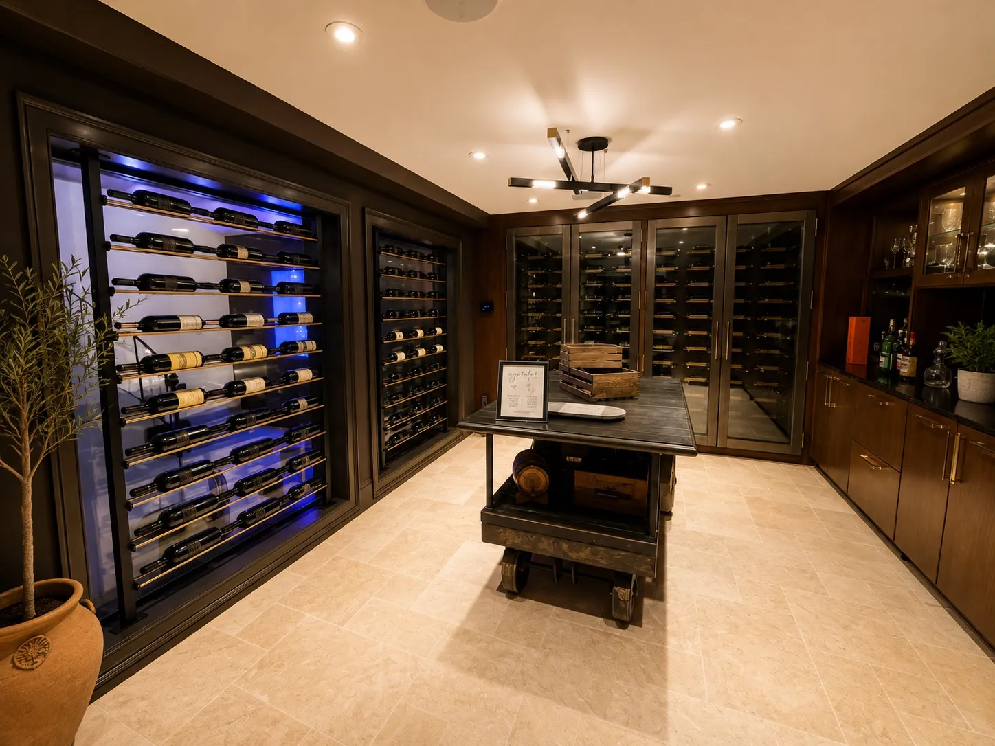 Wine room with integrated wood storage and illuminated bottle displays.