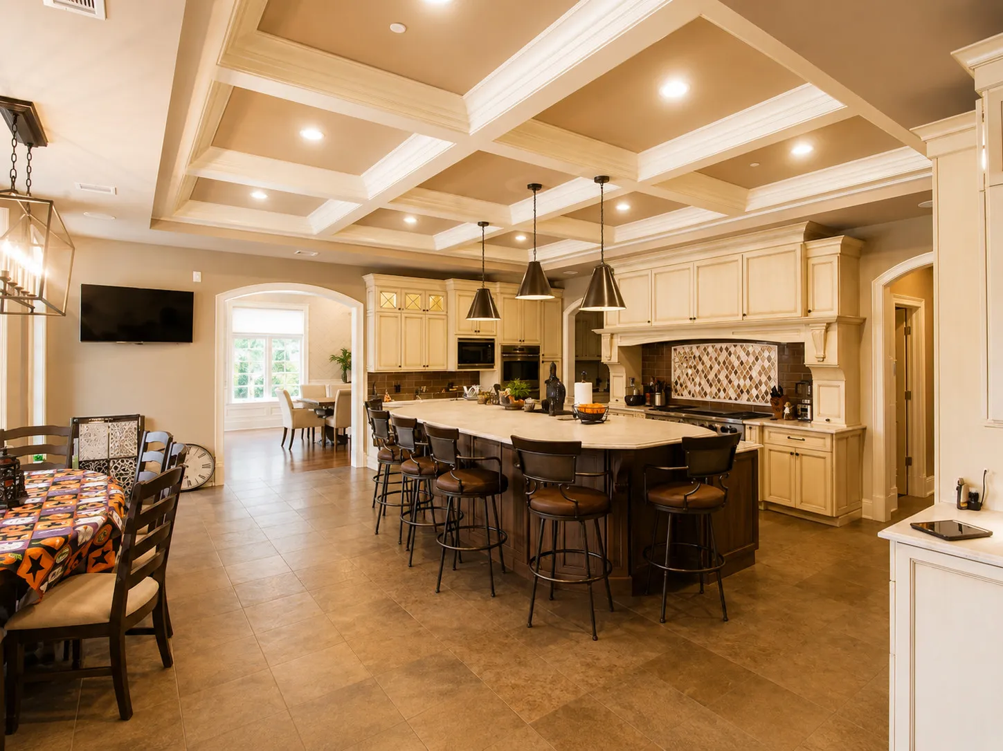 Large kitchen and dining space with a coffered ceiling.