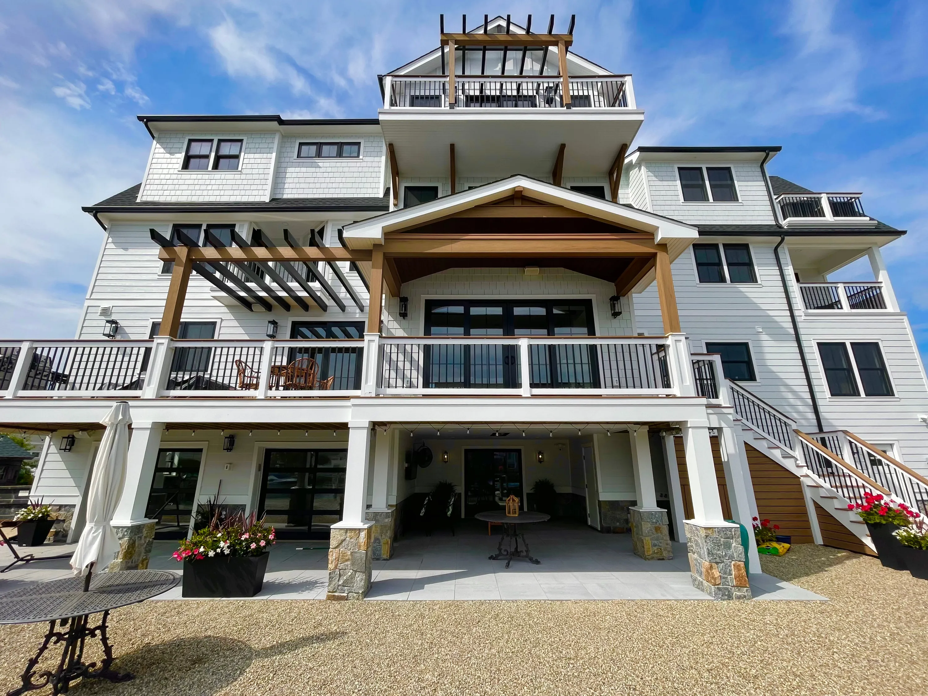 Multi-level rear deck with timber framing on a coastal residence in New Jersey.