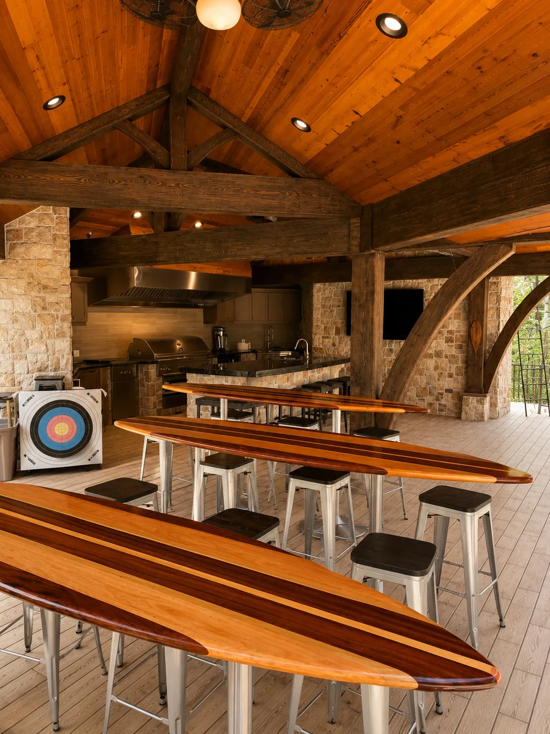 Timber-framed bar with stone walls and wood counters.